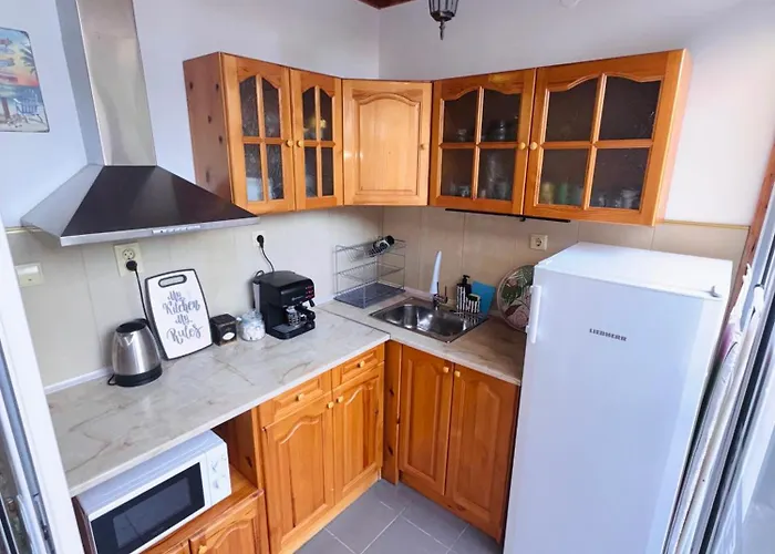 Sun 招待所 希典